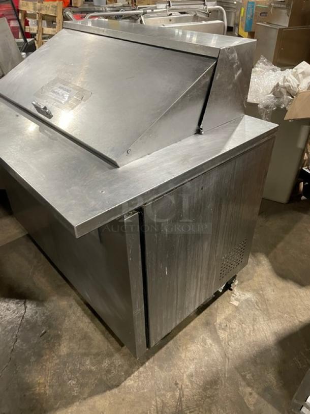 True TSSU-48-18M-B stainless steel 2-door refrigerated prep table on casters, poly-coated racks, 115V, used condition.