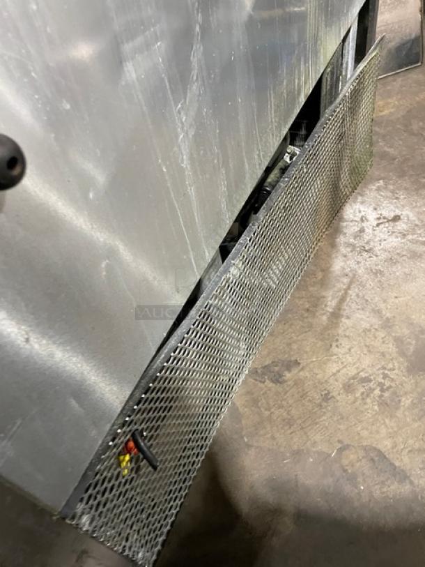 True TSSU-48-18M-B stainless steel prep table, 2-door, refrigerated, with poly coated racks, on casters, 115V, used condition.