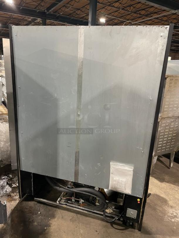 Structural Concepts Oasis CO5978R commercial refrigerated display case in used condition, back view, 115/230V, 1 Phase.