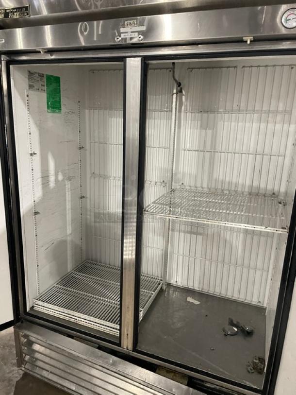 True T-49F Commercial Stainless Steel 2 Door Reach-In Freezer, poly-coated racks, 115V 1 Phase, SN: 1-3721907.