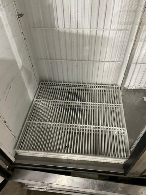 True T-49F commercial stainless steel 2-door reach-in freezer interior with poly-coated wire racks, Model T-49F, SN: 1-3721907.