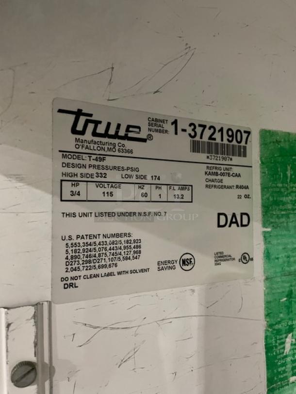 True T-49F Commercial Stainless Steel 2 Door Reach-In Freezer, includes poly-coated wired rack, model label visible.