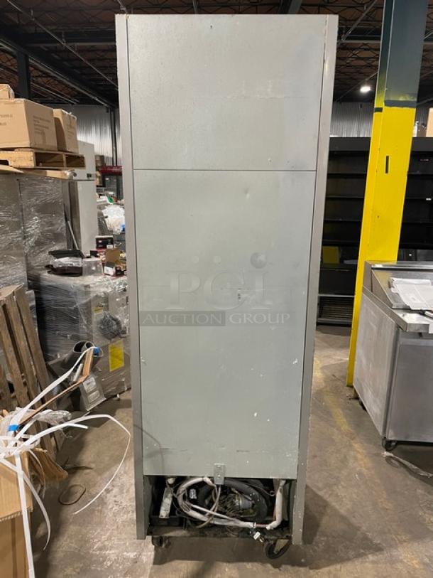 Beverage-Air stainless steel single door reach-in freezer, model KF241AS, with casters, back view, in used condition.