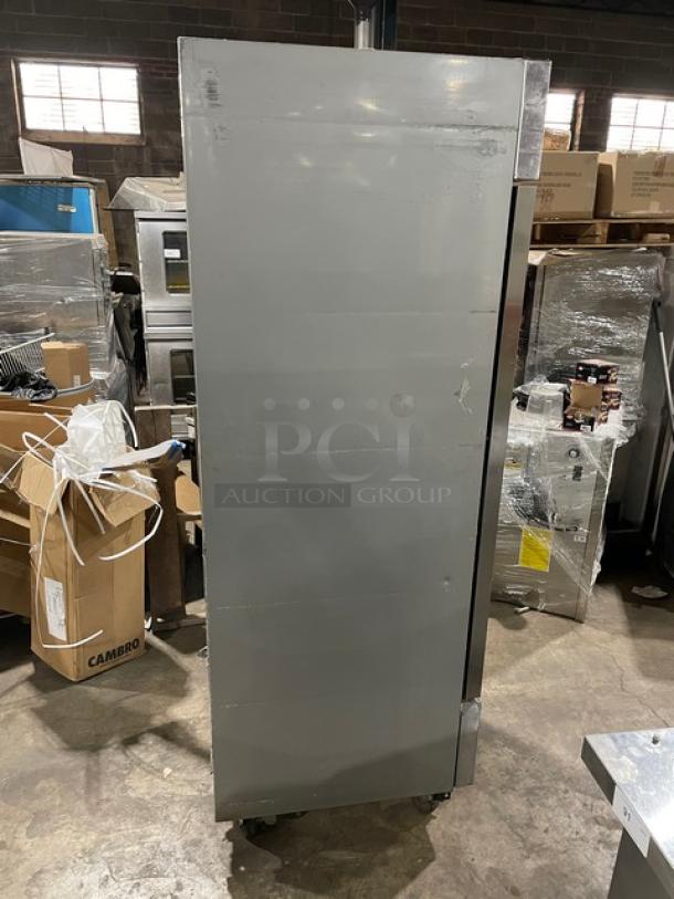 Beverage-Air KF24-1AS commercial stainless steel single door reach-in freezer, includes poly coated wired rack, on casters.