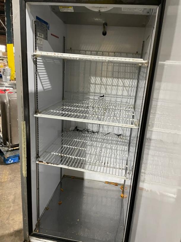 Beverage-Air stainless steel reach-in freezer, model KF24-1AS, with poly-coated wired rack, on casters, SN: 9031804.