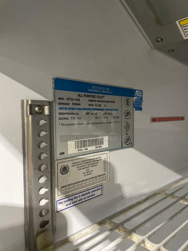 Beverage-Air commercial freezer model KF241AS, stainless steel, single door, with poly coated rack and casters. Model tag visible.