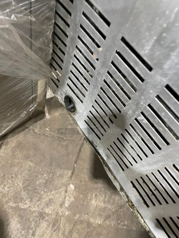 Continental SWF32N stainless steel undercounter freezer, 2-drawer, on casters, ventilation detail visible.