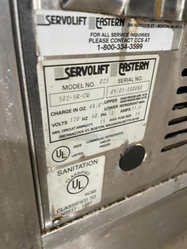 Servolift 502-5R-CW stainless steel refrigerated salad bar with sneeze guard, cabinet base, on casters, 120V.