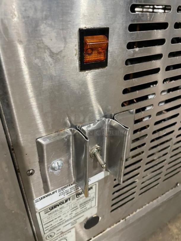 Servolift refrigerated salad bar, model 5055RCW, stainless steel, features a single overhead shelf sneeze guard, cabinet base, and casters.