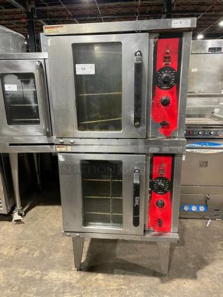 Vulcan commercial double stacked stainless steel convection oven with wired rack, red control panel, on sturdy legs.