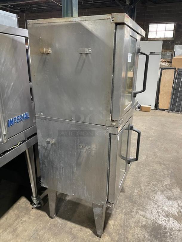 Vulcan commercial stainless steel double stacked convection oven, natural gas powered, on legs, includes wired oven rack.