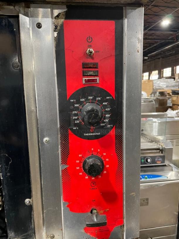 Vulcan commercial stainless steel natural gas convection oven, double-stacked, with thermostat and timer controls.