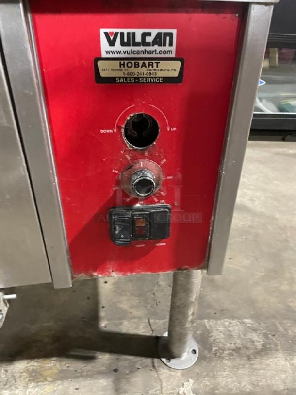 Vulcan commercial stainless steel tilt skillet with visible control panel, natural gas powered, mounted on legs.