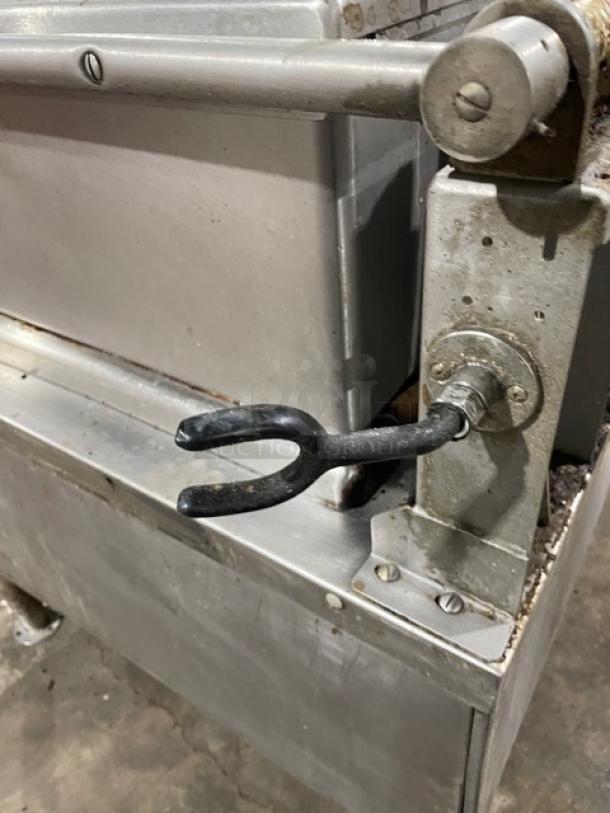 Vulcan commercial stainless steel natural gas-powered tilt skillet, featuring ultra-tilt mechanism, on legs, in used condition.