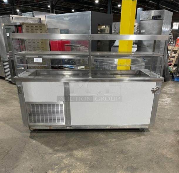 Servolift stainless steel refrigerated salad bar with sneeze guard, Model 502-5R-CW, cabinet base, 120V, on casters.