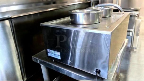 Winco FW-S500 electric food warmer in superb condition, 120V, stainless steel, fully tested and working, tag visible.