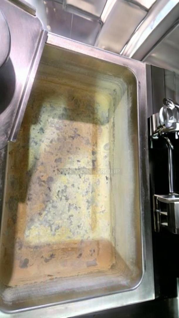 Winco FW-S500 electric food warmer in superb condition, stainless steel, fully tested, 120V, interior view displayed.