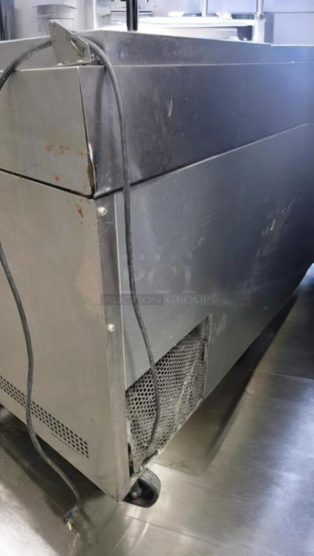 True TPP-93 Refrigerated Pizza Prep Table in outstanding condition, 93" wide, tested and fully working. Visible wear and cords.