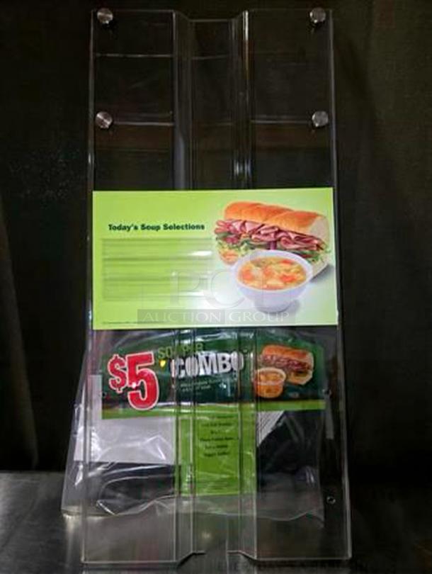 Like-new acrylic display rack, dual-slot for soup and sandwich promos, fully cleaned, unbranded commercial grade.