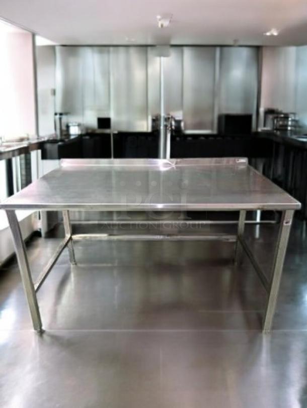 Stainless steel prep table, 60" x 36" x 36", immaculate condition, commercial grade, heavy-duty worktable.