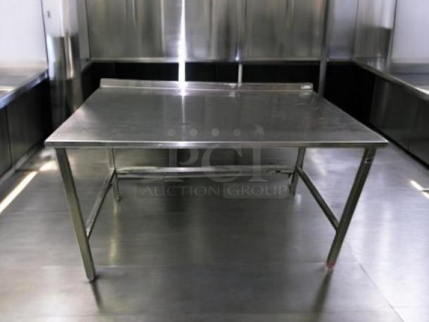 Immaculate condition stainless steel prep table, 60"x36"x36", commercial grade, fully cleaned, ready for use.