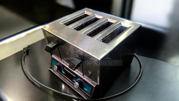 Toastmaster TP409 commercial 4-slot toaster in outstanding condition, 120V, fully tested and working, with control knobs.