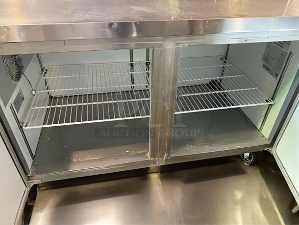 Kintera KRR70X two-door pizza prep refrigerator, stainless steel, shelves visible, excellent condition, 115V, fully tested.