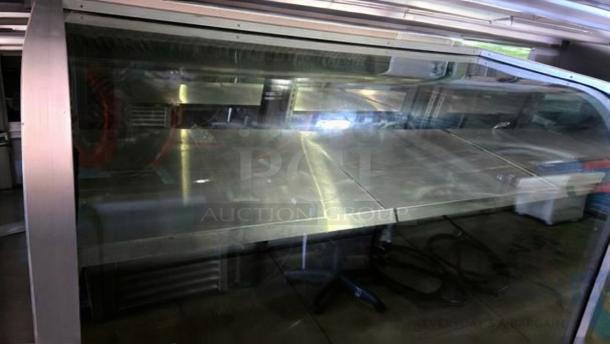 Schmidt EHD-4 refrigerated bakery display case in outstanding condition, 115V, with clear glass and stainless steel interior.