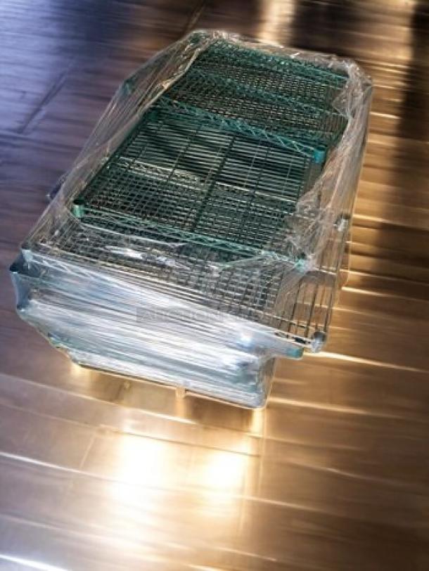 Three complete sets of Metro Shelving Systems heavy-duty chrome wire units, stacked and wrapped, in great condition.