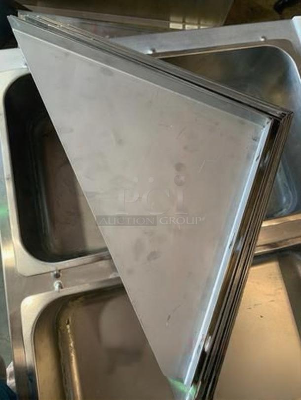 Set of 7 heavy-duty stainless steel wall shelves with mounting brackets, pristine condition, commercial-grade fabrication.