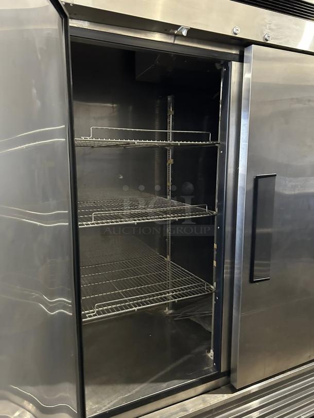 Turbo Air TSR-72SD-N Super Deluxe 82" refrigerator in excellent condition. Features solid doors, bottom mount, tested and working.