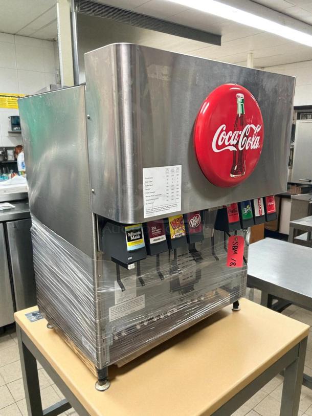 Lancer countertop ice and soft drink dispenser, model 85-4548H-111, 250lb storage, cup fill, tested 115v, Coca-Cola branding.