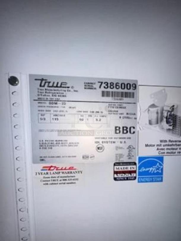 Alt text: True GDM-23-HC-LD Single Glass Door Merchandising Refrigerator label, showing model, make, serial number, and energy star certification.