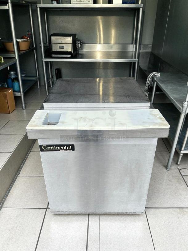 Continental Refrigerator SW27-N-12M-FB sandwich prep table, stainless steel, 27", one door, tested and working, front breathing.