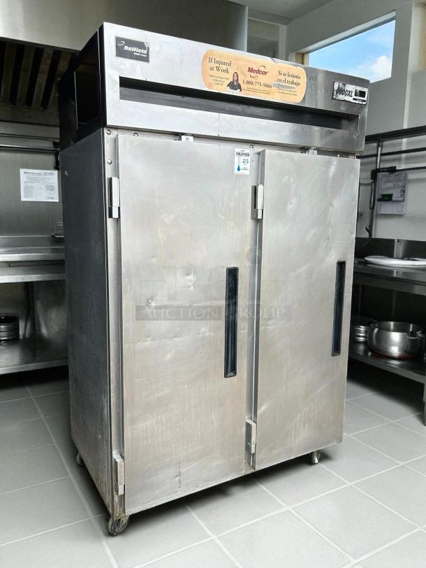 Delfield 6151XL-S 50" two-section reach-in freezer in excellent condition, stainless steel, full doors, tested and working.