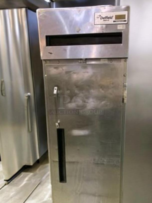 Delfield 6025XL-S single door reach-in refrigerator in superb condition. Stainless steel, tested, and working. Model label visible.