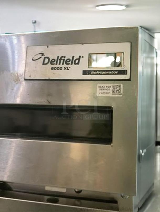 Delfield 6025XL-S single solid door refrigerator. Stainless steel, outstanding condition, tested and working. Model label visible.