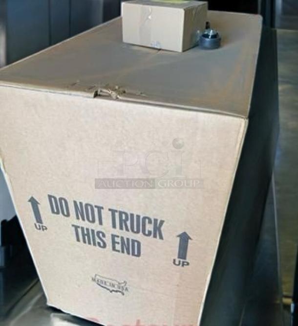 Brand new Beverage-Air BB48HC-1-B-27-ALT 48" back bar refrigerator in factory-sealed box with handling instructions visible.