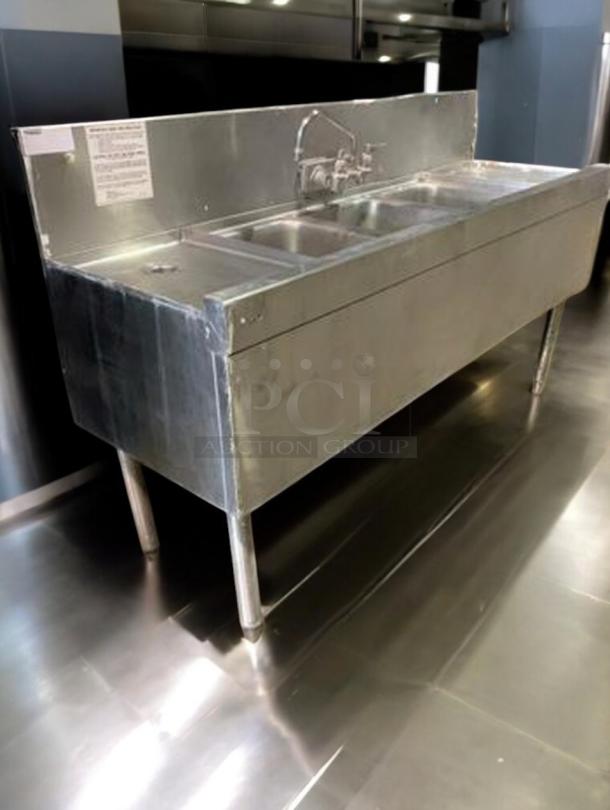 Superb condition 60" x 19" stainless steel 3-compartment bar sink with faucet by Commercial Stainless Fabrication.