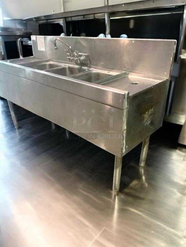 Superb condition stainless steel 3-compartment bar sink, 60"x19"x35", includes faucet and drainboards, by Commercial Stainless Fabrication.