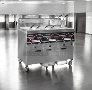 Henny Penny EEG-243 FFFX ST triple-well gas deep fryer with Oil Guardian, outstanding condition, fully tested, natural gas.