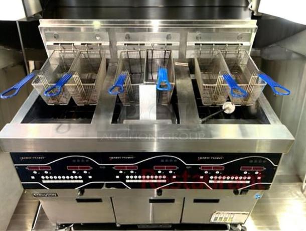 Henny Penny EEG-243 FFFX ST triple well gas deep fryer, outstanding condition, features Oil Guardian, fully tested, natural gas.