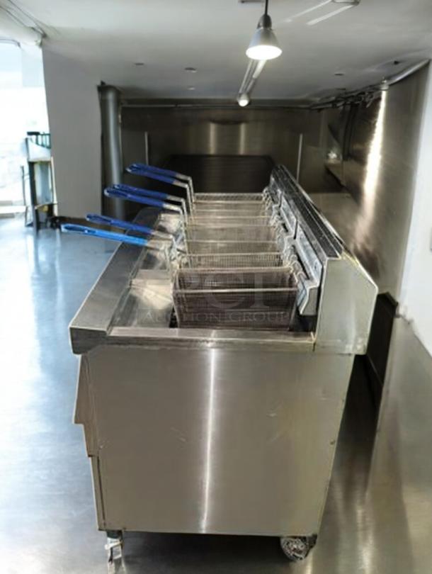 Henny Penny EEG-243 FFFX ST triple-well gas fryer in outstanding condition, featuring Oil Guardian, fully tested and working.