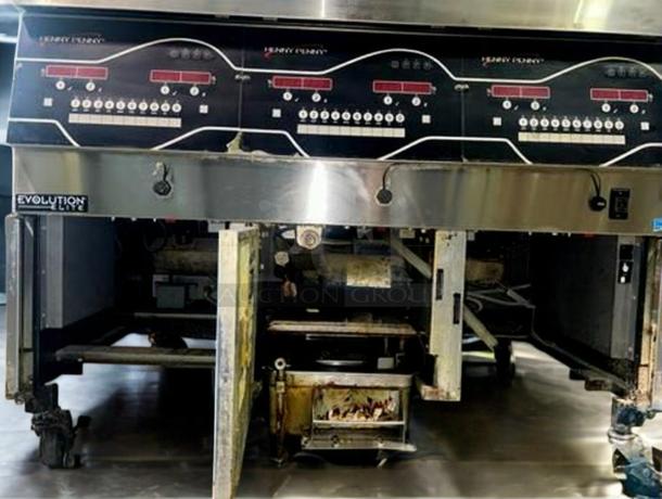 Henny Penny EEG-243 FFFX ST triple-well gas fryer with Oil Guardian, stainless steel, fully tested, excellent condition.