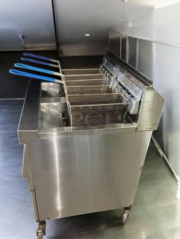 Henny Penny EEG-242 FFXX ST double vat gas fryer, stainless steel, four baskets, in immaculate condition, natural gas.