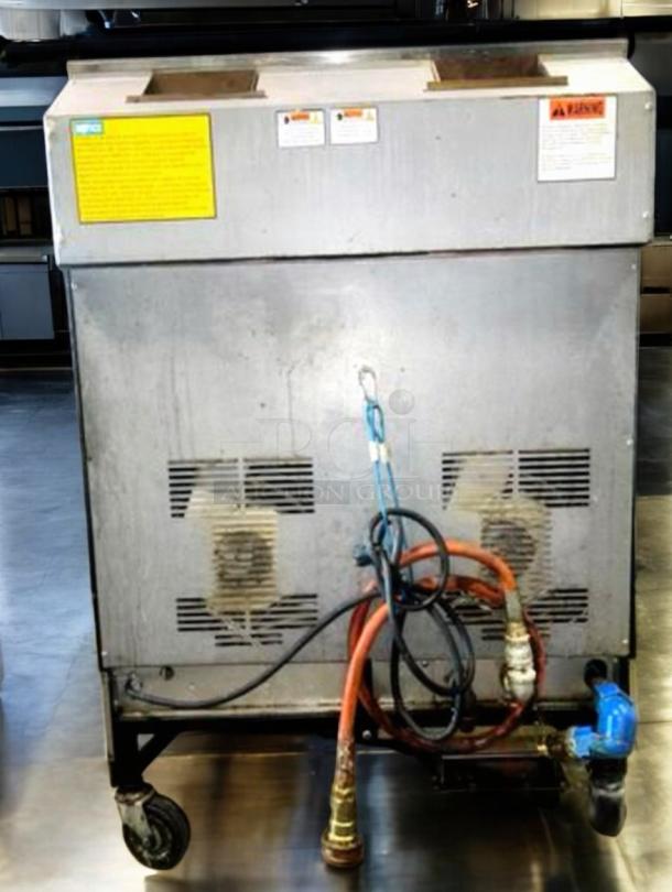 Henny Penny EEG-242 FFXX ST gas fryer, double vat, four baskets, stainless steel, immaculate condition, fully tested.