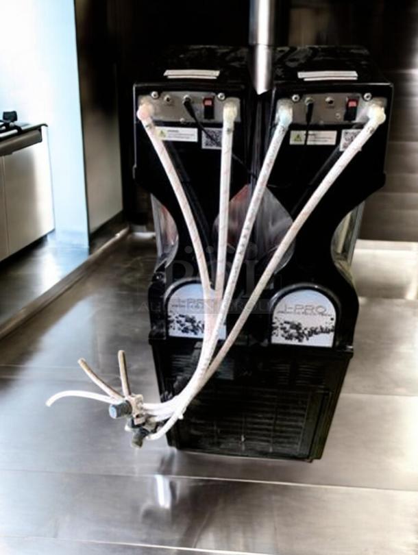 Immaculate SPM I-Pro 2M Twin Bowl Granita Machine, 115V; fully tested, black casing, visible control panel, hoses attached.