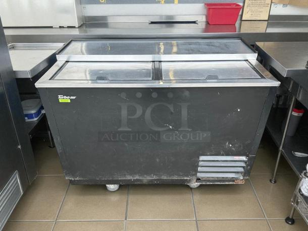 Turbo Air TBC-50SB-N6 50" bottle cooler with two solid doors, used with visible wear, tested and working.