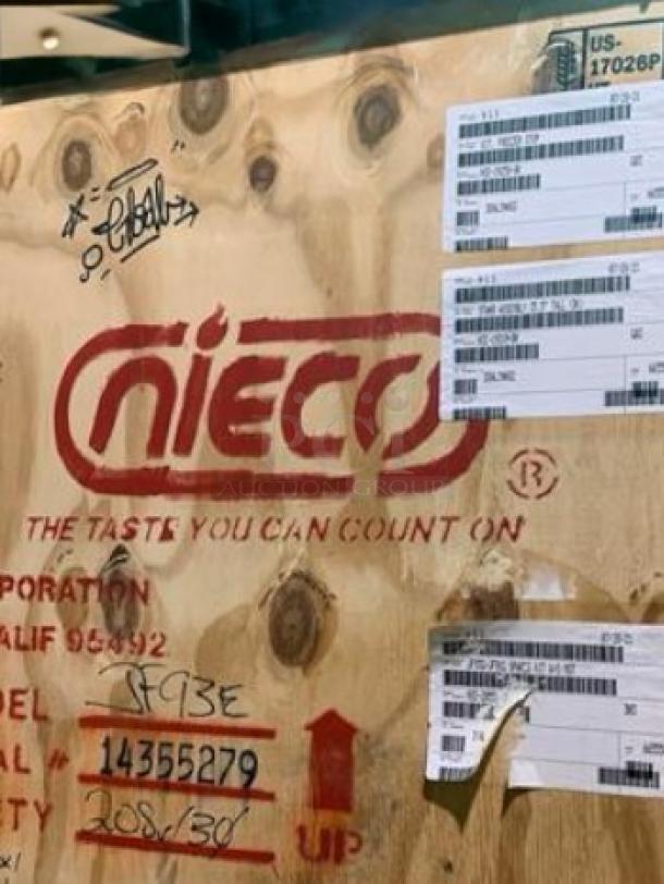 Brand new Nieco JF93E electric automatic broiler in packaging. Model details and markings visible on crate. 208/230V.