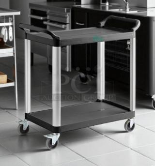 Brand new Choice black utility bussing cart, two shelves, sturdy wheels, ergonomic handles, perfect for commercial use.